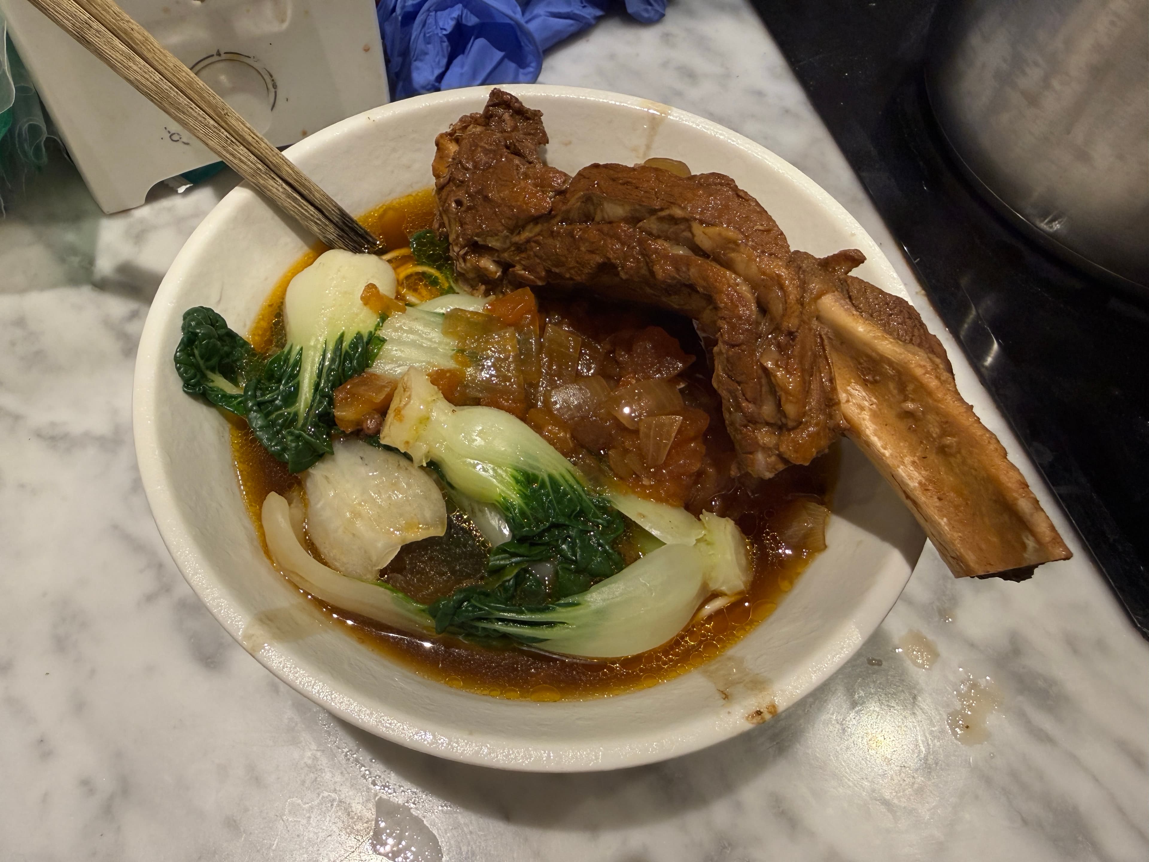 Beef back ribs tomato soup in a serving bowl